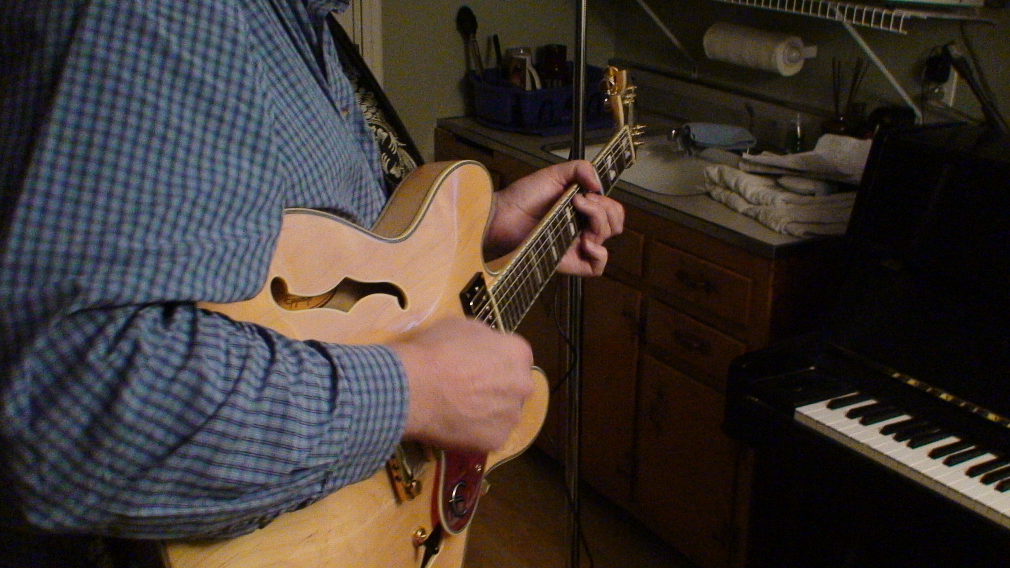 Tom laying down some guitar.